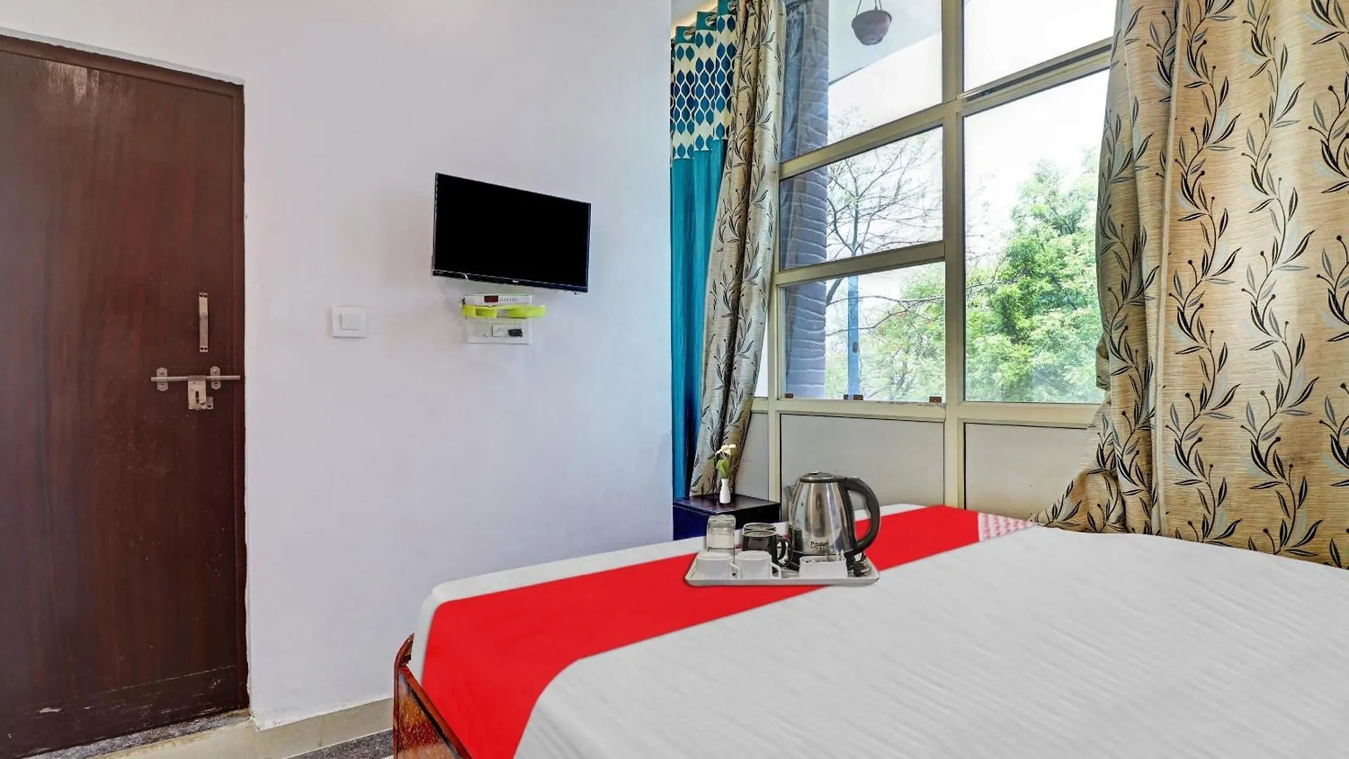 Hotel O M.G. Palace Tajganj